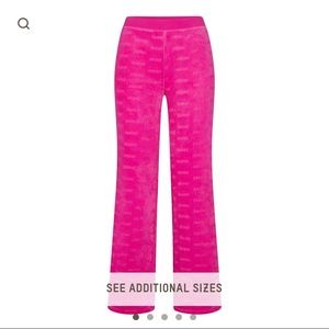 SKIMS Velour Logo Pants in Hot Pink
